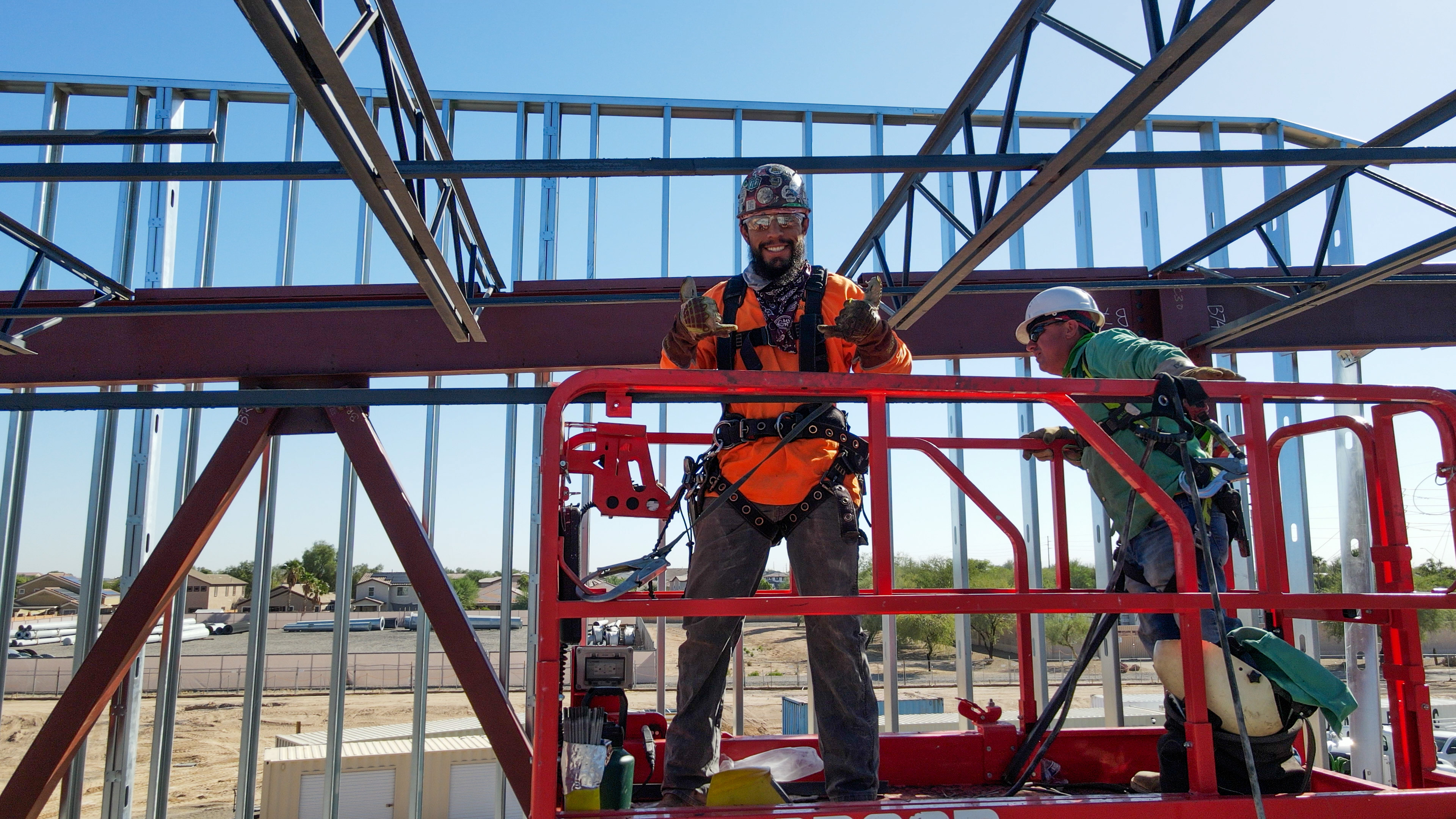 Ellyson ironworker on a man-lift during steel erection