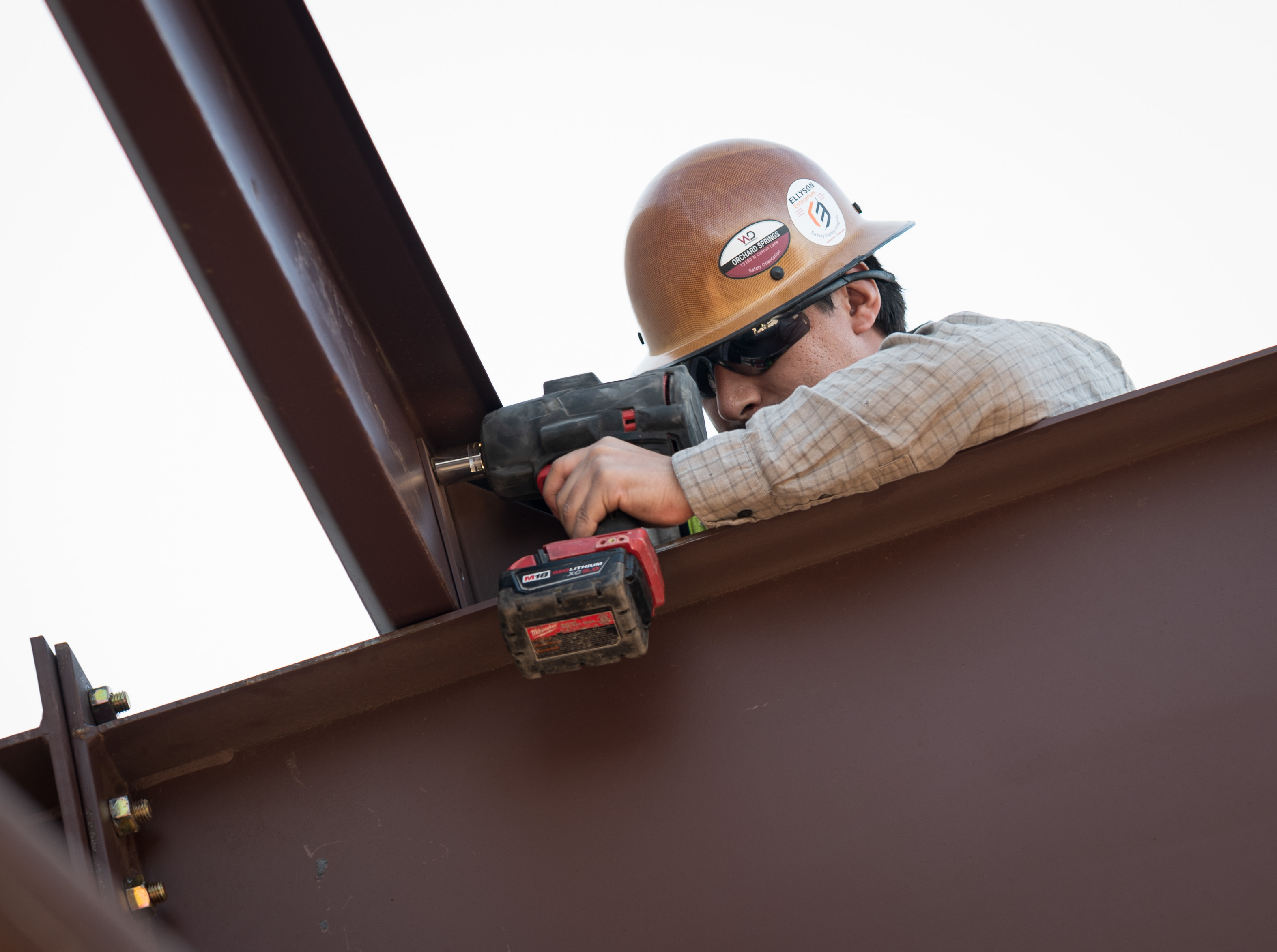 Ellyson crew member torquing a structural bolt connection