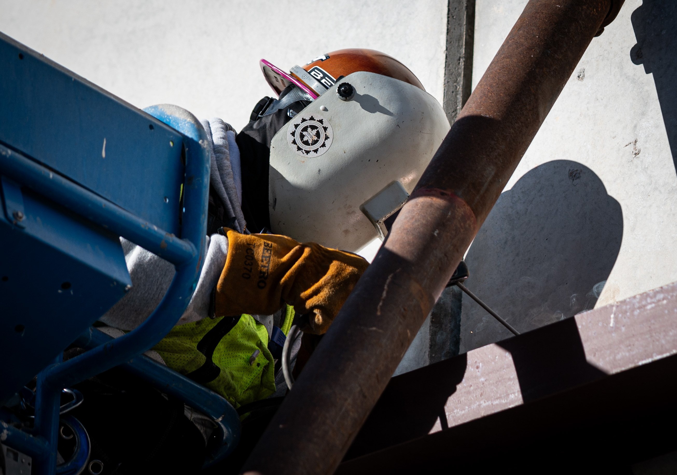 Welder working on angle and channel members